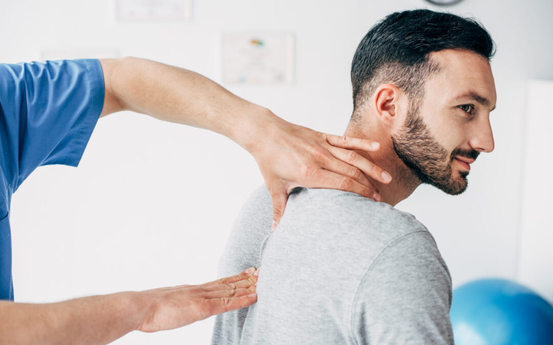 Chiropractor with a patient